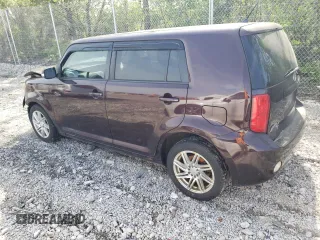 2010 Scion xB z VIN JTLZE4FE5A1106933, wystawiony jako Copart lot #54170065 z przebiegiem 243 524 mil mil oraz Szkoda całkowita • Salvage title. Historia ofert i sprzedaży dostępna na DreamBid. Obrazek 2.