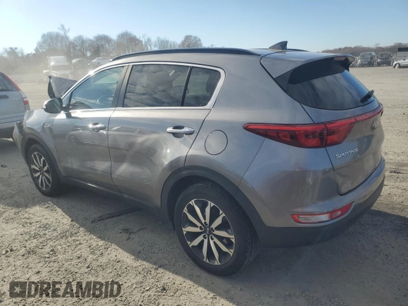 2018 Kia Sportage EX z VIN KNDPNCAC1J7308457, wystawiony jako Copart lot #81574704 z przebiegiem Nie podano mil oraz Szkoda całkowita • Salvage title. Historia ofert i sprzedaży dostępna na DreamBid. Obrazek 2.