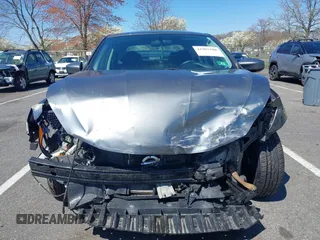 2018 Nissan Sentra SV with VIN 3N1AB7AP3JL633148, listed as a IAAI auction lot 41983588 with 148,479 mi miles and . Bid and sale history available at DreamBid. Image 12.