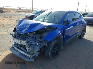 2019 Toyota C-HR XLE with VIN NMTKHMBX3KR098510, listed as a IAAI auction lot 41289899 with 112,981 mi miles. Bid and sale history available at carsss.com. Image 18.