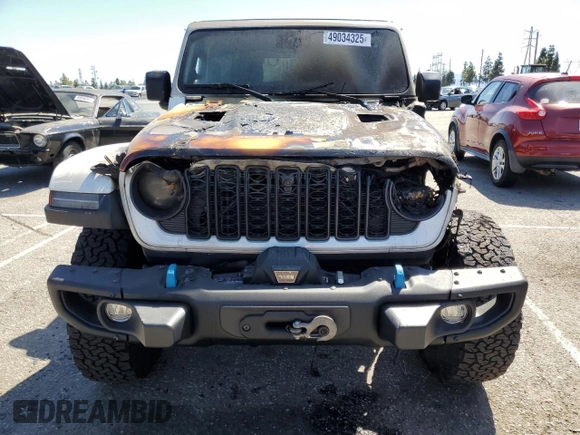 2024 Jeep Wrangler Rubicon X с VIN 1C4RJXR62RW167216, выставлен на аукционе Copart как лот 49034325 с пробегом Не указан миль и Списание • Salvage title. История ставок и продаж доступна на DreamBid. Изображение 5.