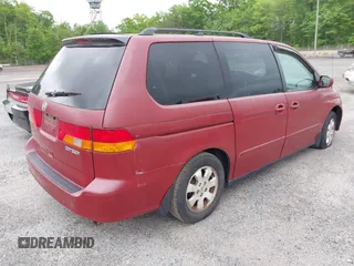 2002 Honda Odyssey EX-L z VIN 2HKRL18092H572036, wystawiony jako IAAI lot #42122713 z przebiegiem Nie podano mil oraz . Historia ofert i sprzedaży dostępna na DreamBid. Obrazek 4.