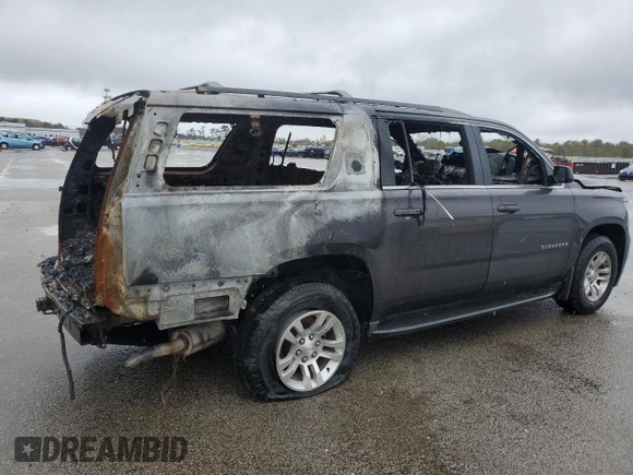 2018 Chevrolet Suburban LT z VIN 1GNSKHKC9JR262273, wystawiony jako Copart lot #51970175 z przebiegiem Nie podano mil oraz Szkoda całkowita • Salvage title. Historia ofert i sprzedaży dostępna na DreamBid. Obrazek 3.