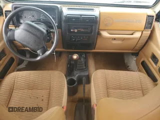 1998 Jeep Wrangler SE with VIN 1J4FY29P6WP796472, listed as a Copart auction lot 54879025 with 118,664 mi miles and Salvage title. Bid and sale history available at DreamBid. Image 8.
