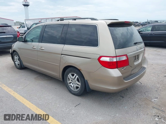 2005 Honda Odyssey EX with VIN 5FNRL38475B029026, listed as a IAAI auction lot 42489079 with 156,075 mi miles and . Bid and sale history available at DreamBid. Image 3.