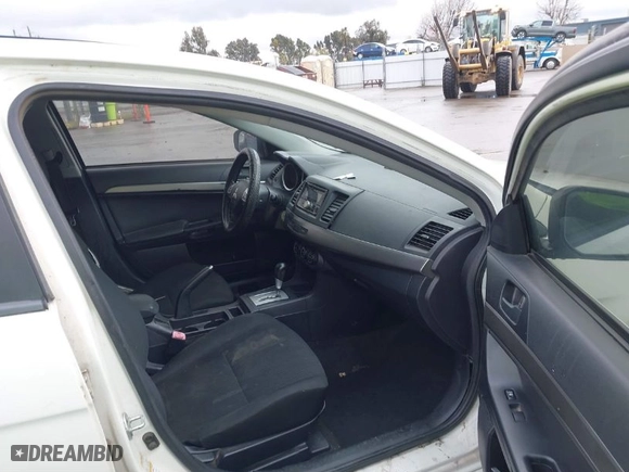 2015 Mitsubishi Lancer ES with VIN JA32U2FU5FU012387, listed as a IAAI auction lot 41804174 with 232023 miles. Bid and sale history available at carsss.com. Image 5.
