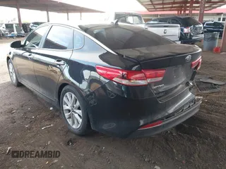 2018 Kia Optima LX with VIN 5XXGT4L39JG251635, listed as a IAAI auction lot 41933408 with 135,718 mi miles. Bid and sale history available at carsss.com. Image 3.