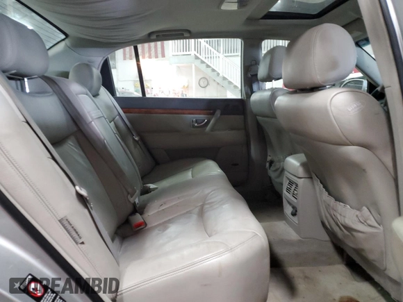 2005 Kia Amanti z VIN KNALD124755058346, wystawiony jako Copart lot #41683255 z przebiegiem 180 396 mil mil oraz Szkoda całkowita • Salvage title. Historia ofert i sprzedaży dostępna na DreamBid. Obrazek 10.