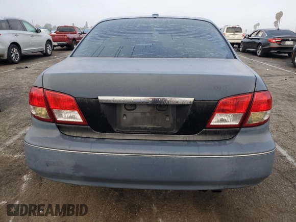 2004 Infiniti I35 z VIN JNKDA31A54T212810, wystawiony jako Copart lot #72467654 z przebiegiem 137 809 mil mil oraz Szkoda całkowita • Salvage title. Historia ofert i sprzedaży dostępna na DreamBid. Obrazek 6.