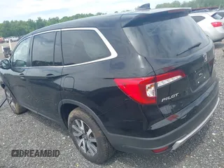2021 Honda Pilot EX-L with VIN 5FNYF6H53MB097089, listed as a IAAI auction lot 42309359 with 58,371 mi miles and . Bid and sale history available at DreamBid. Image 3.