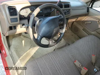 1998 Nissan Frontier XE with VIN 1N6DD21S4WC343917, listed as a Copart auction lot 59346585 with 127,324 mi miles and Salvage title. Bid and sale history available at DreamBid. Image 8.