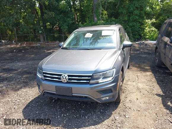 2018 Volkswagen Tiguan SEL with VIN 3VV2B7AXXJM020392, listed as a IAAI auction lot 42646948 with 58,685 mi miles and . Bid and sale history available at DreamBid. Image 12.