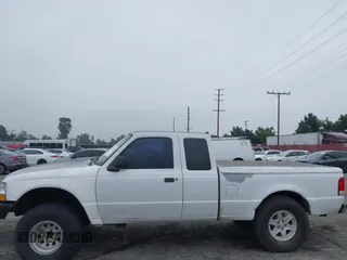 2000 Ford Ranger XLT with VIN 1FTZR15XXYPB55957, listed as a IAAI auction lot 42431758 with 349,550 mi miles and . Bid and sale history available at DreamBid. Image 14.