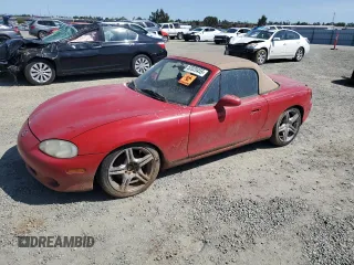 2001 Mazda MX-5 Miata with VIN JM1NB353010206537, listed as a Copart auction lot 52020455 with 107,078 mi miles and Salvage title. Bid and sale history available at DreamBid. Image 1.