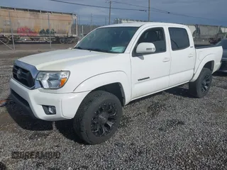 2015 Toyota Tacoma with VIN 3TMLU4EN5FM188601, listed as a IAAI auction lot 41883555 with 143,904 mi miles and . Bid and sale history available at DreamBid. Image 18.