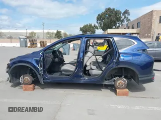 2020 Honda CR-V EX-L z VIN 7FART6H8XLE006023, wystawiony jako IAAI lot #41915468 z przebiegiem Nie podano mil oraz . Historia ofert i sprzedaży dostępna na DreamBid. Obrazek 13.