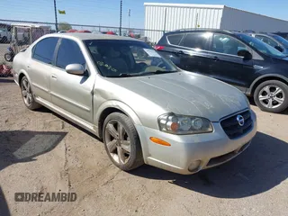 2002 Nissan Maxima GLE z VIN JN1DA31D52T424425, wystawiony jako IAAI lot #41702531 z przebiegiem Nie podano mil oraz . Historia ofert i sprzedaży dostępna na DreamBid. Obrazek 1.