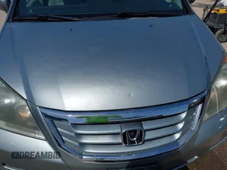 2010 Honda Odyssey EX with VIN 5FNRL3H44AB059711, listed as a IAAI auction lot 42057760 with 225,486 mi miles and . Bid and sale history available at DreamBid. Image 6.