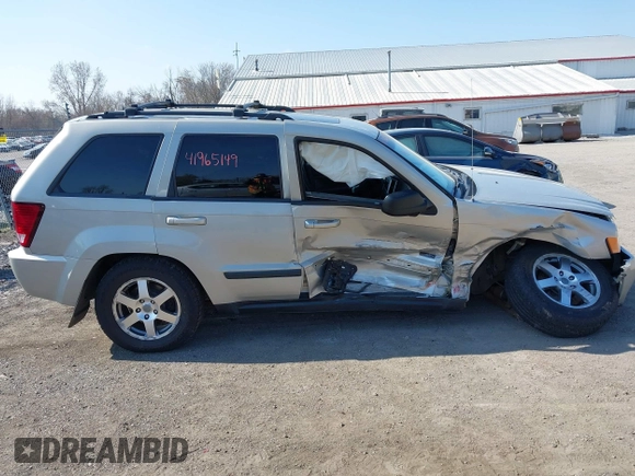 2008 Jeep Grand Cherokee Laredo with VIN 1J8GR48K28C169859, listed as a IAAI auction lot 41965149 with 166,069 mi miles. Bid and sale history available at carsss.com. Image 13.
