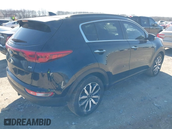 2018 Kia Sportage EX with VIN KNDPNCAC9J7324292, listed as a IAAI auction lot 41859338 with 124,519 mi miles and . Bid and sale history available at carsss.com. Image 4.