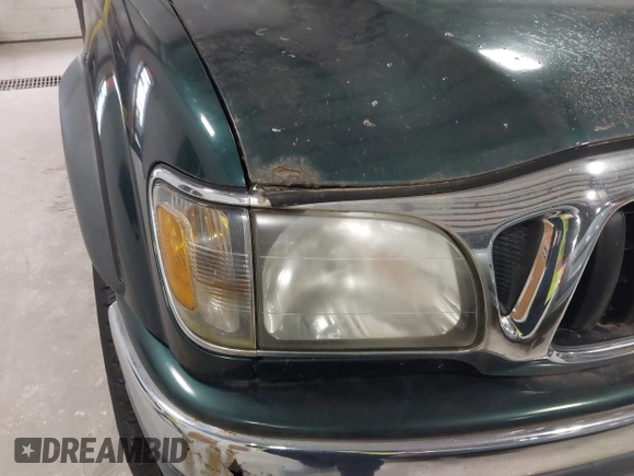 2003 Toyota Tacoma with VIN 5TEWN72N03Z166634, listed as a IAAI auction lot 41987641 with Not Provided miles. Bid and sale history available at carsss.com. Image 18.