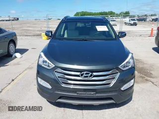 2014 Hyundai Santa Fe with VIN 5XYZUDLB0EG187984, listed as a IAAI auction lot 42607599 with 111,594 mi miles and . Bid and sale history available at DreamBid. Image 6.