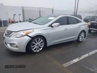 2014 Hyundai Azera Limited with VIN KMHFH4JG7EA388931, listed as a IAAI auction lot 41468407 with 130,597 mi miles and . Bid and sale history available at DreamBid. Image 17.