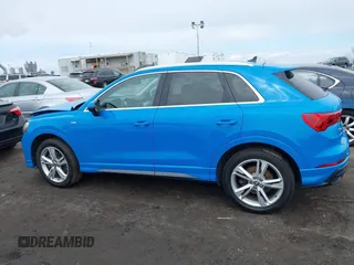 2020 Audi Q3 S line Premium z VIN WA1DECF39L1013425, wystawiony jako IAAI lot #41851042 z przebiegiem 57 901 mil mil oraz . Historia ofert i sprzedaży dostępna na DreamBid. Obrazek 14.