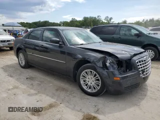 2009 Chrysler 300 LX z VIN 2C3KA43D79H556962, wystawiony jako Copart lot #58315205 z przebiegiem 177 577 mil mil oraz Szkoda całkowita • Salvage title. Historia ofert i sprzedaży dostępna na DreamBid. Obrazek 4.