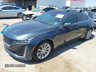 2021 Cadillac CT5 Luxury z VIN 1G6DW5RKXM0144424, wystawiony jako IAAI lot #41985803 z przebiegiem 65 555 mil mil oraz . Historia ofert i sprzedaży dostępna na DreamBid. Obrazek 17.