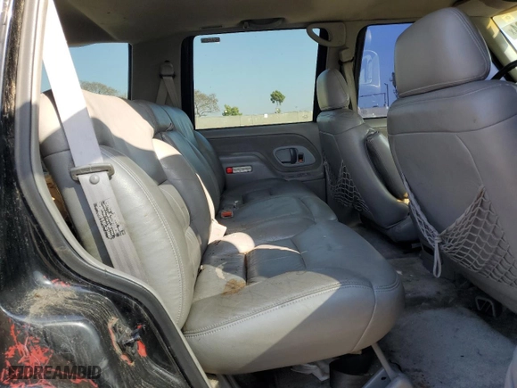1999 Chevrolet Tahoe Z71 with VIN 1GNEK13R5XJ308924, listed as a Copart auction lot 64463984 with 229,181 mi miles and Salvage Title. Bid and sale history available at carsss.com. Image 11.