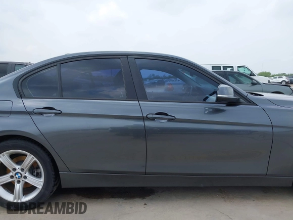 2013 BMW 3 Series 320i with VIN WBA3B1C53DK128602, listed as a IAAI auction lot 41952771 with 103,564 mi miles and . Bid and sale history available at carsss.com. Image 14.