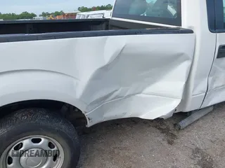 2014 Ford F-150 XL with VIN 1FTNF1CTXEKD77219, listed as a IAAI auction lot 42777146 with 141,338 mi miles and . Bid and sale history available at DreamBid. Image 6.