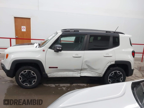 2015 Jeep Renegade Trailhawk with VIN ZACCJBCT2FPC33277, listed as a IAAI auction lot 41571863 with 98,912 mi miles and . Bid and sale history available at DreamBid. Image 15.