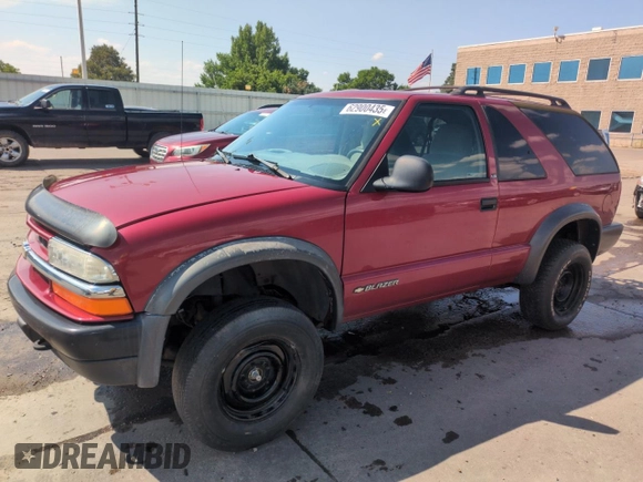 1998 Chevrolet Blazer LS with VIN 1GNCT18W5WK236585, listed as a Copart auction lot 62900435 with 123,272 mi miles and Salvage title. Bid and sale history available at DreamBid. Image 1.