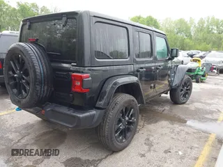 2024 Jeep Wrangler Sahara with VIN 1C4RJXP67RW274877, listed as a IAAI auction lot 42119319 with 7,157 mi miles and . Bid and sale history available at DreamBid. Image 4.