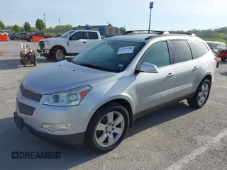 2011 Chevrolet Traverse LTZ with VIN 1GNKVLEDXBJ250325, listed as a IAAI auction lot 42107708 with 203,439 mi miles and . Bid and sale history available at DreamBid. Image 2.