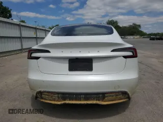 2025 Tesla Model 3 Long Range z VIN 5YJ3E1EAXSF971341, wystawiony jako Copart lot #57615695 z przebiegiem 4 823 mil mil oraz Szkoda całkowita • Salvage title. Historia ofert i sprzedaży dostępna na DreamBid. Obrazek 6.