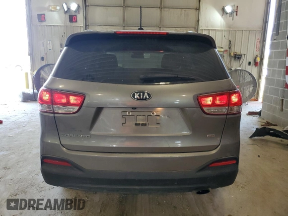 2017 Kia Sorento LX z VIN 5XYPGDA33HG293392, wystawiony jako Copart lot #62642604 z przebiegiem 73 242 mil mil oraz Szkoda całkowita • Salvage title. Historia ofert i sprzedaży dostępna na DreamBid. Obrazek 6.