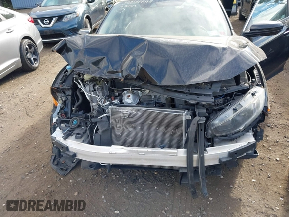 2019 Honda Civic LX with VIN 2HGFC2F65KH549993, listed as a IAAI auction lot 40394538 with 92,951 mi miles and . Bid and sale history available at DreamBid. Image 6.