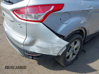 2016 Ford Escape SE z VIN 1FMCU9GXXGUB78201, wystawiony jako IAAI lot #42048676 z przebiegiem 139 144 mil mil oraz . Historia ofert i sprzedaży dostępna na DreamBid. Obrazek 6.