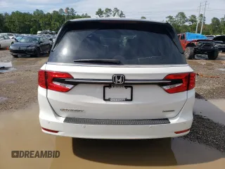 2024 Honda Odyssey Touring with VIN 5FNRL6H84RB024909, listed as a Copart auction lot 56226255 with 11,094 mi miles and Salvage title. Bid and sale history available at DreamBid. Image 6.
