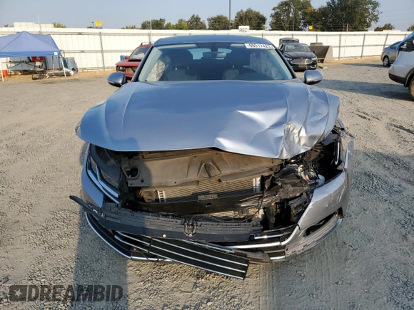2019 Volkswagen Arteon SE z VIN WVWBR7AN7KE000360, wystawiony jako Copart lot #69217423 z przebiegiem 28 694 mil mil oraz . Historia ofert i sprzedaży dostępna na DreamBid. Obrazek 5.