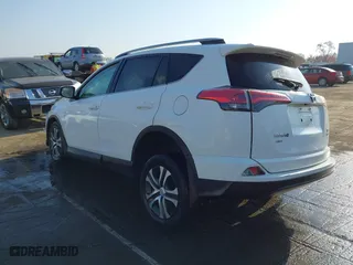 2018 Toyota RAV4 LE with VIN 2T3BFREV5JW854513, listed as a IAAI auction lot 41804823 with 138,476 mi miles. Bid and sale history available at carsss.com. Image 3.