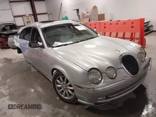 2001 Jaguar S-Type with VIN SAJDA01P81GM09061, listed as a IAAI auction lot 41554986 with 104,105 mi miles and . Bid and sale history available at DreamBid. Image 1.