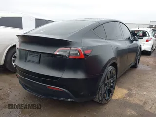 2022 Tesla Model Y Performance z VIN 7SAYGDEF4NF350696, wystawiony jako IAAI lot #41662924 z przebiegiem 36 747 mil mil oraz . Historia ofert i sprzedaży dostępna na DreamBid. Obrazek 4.