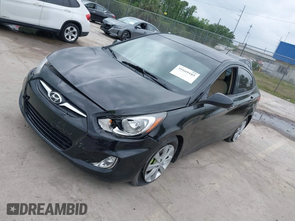 2013 Hyundai Accent GLS with VIN KMHCU4AE4DU422690, listed as a IAAI auction lot 39169185 with 138,438 mi miles. Bid and sale history available at carsss.com. Image 2.
