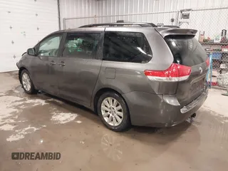 2011 Toyota Sienna LE with VIN 5TDJK3DC2BS013045, listed as a IAAI auction lot 41127037 with 239,401 mi miles. Bid and sale history available at carsss.com. Image 3.