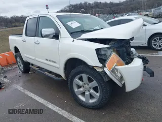 2012 Nissan Titan SL with VIN 1N6AA0EC7CN311109, listed as a IAAI auction lot 41420110 with 209,731 mi miles and . Bid and sale history available at DreamBid. Image 1.
