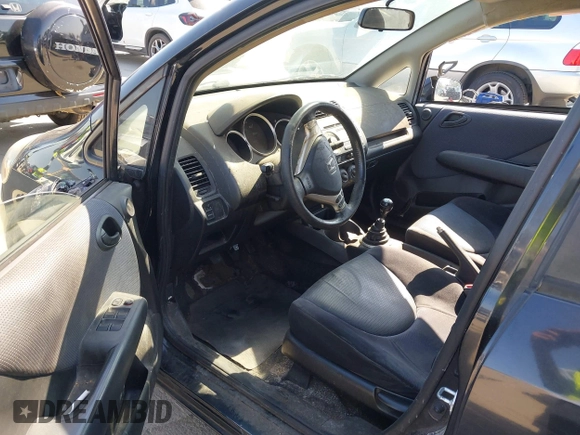 2007 Honda Fit Sport with VIN JHMGD37637S005754, listed as a IAAI auction lot 42663714 with 239,000 mi miles and . Bid and sale history available at DreamBid. Image 5.